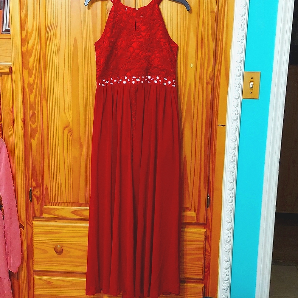 A dress it's more like a flowy jumpsuit  and it has shorts under it.